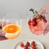 imageLamosi 24 Pack Plastic Wine Glasses Disposable 16 oz Stemless Wine Glasses for Party Reusable Crystal Clear Plastic Cups Shatterproof and BPAFreeClear
